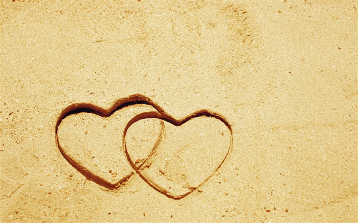 Zwei Herzen Liebe auf dem Sand Hintergrundbilder Bilder