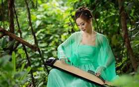 Grünen Kleid asiatische Mädchen spielt die Zither HD Hintergrundbilder