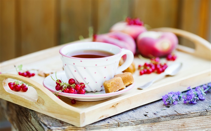 Eine Tasse Tee, rote Beeren Hintergrundbilder Bilder