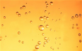 Wassertropfen , orange Hintergrund